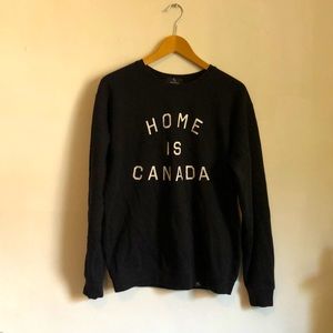 Peace collective home is Canada crewneck